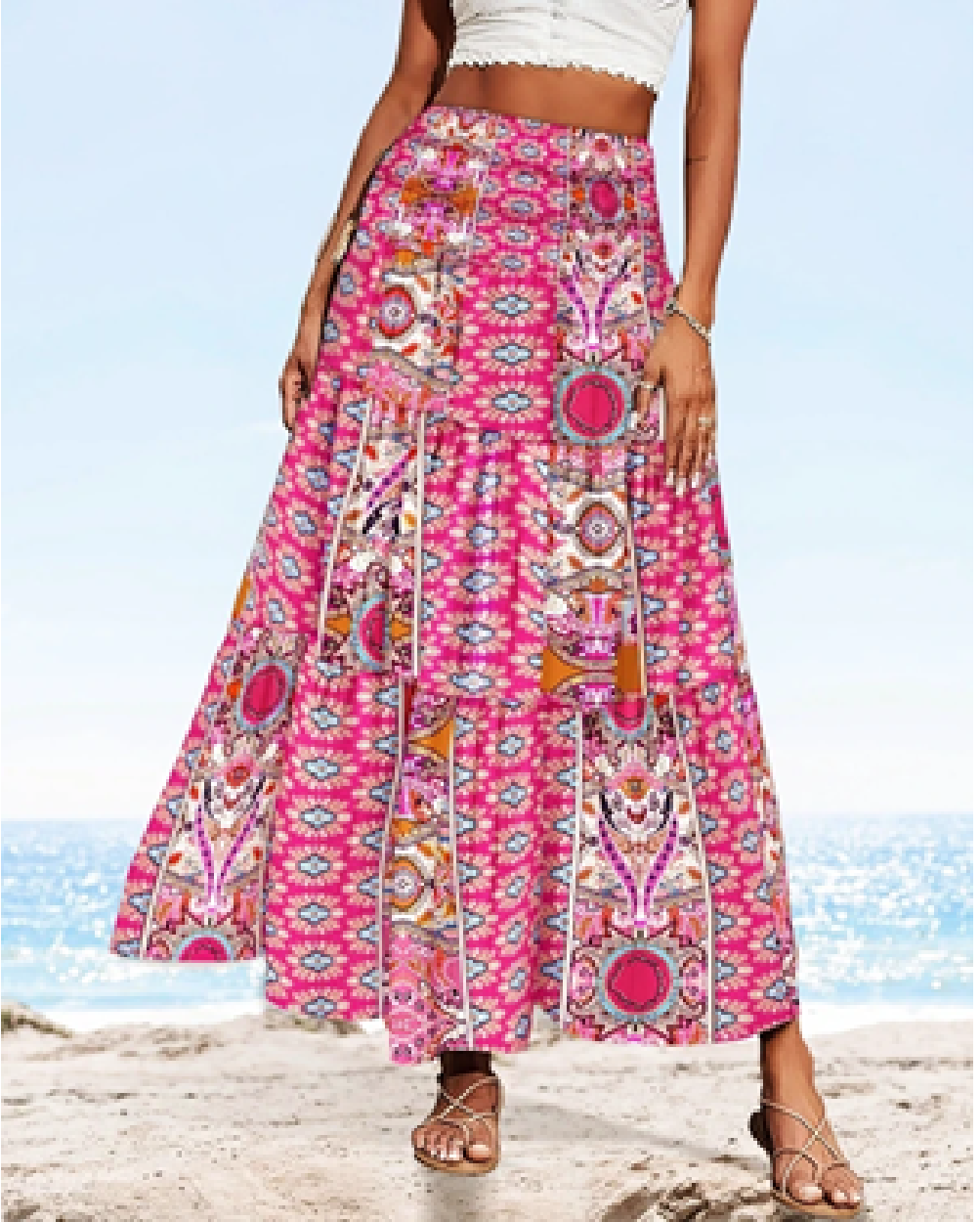 Rose red multicolor floral border print maxi skirt with geometric details, shown from the front.