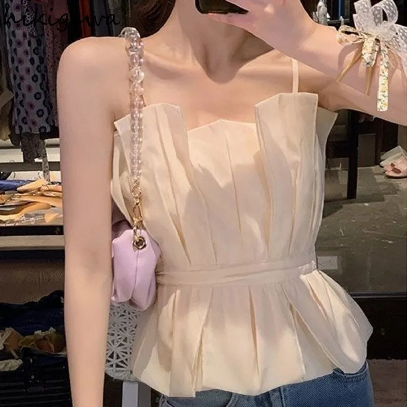 Apricot pleated peplum top with straps and slim waist design