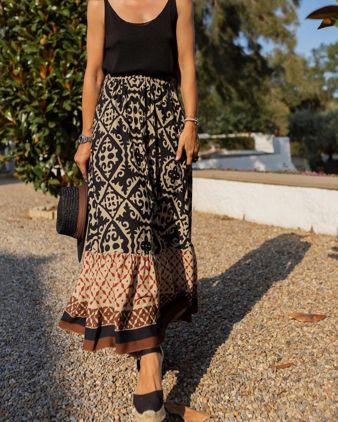 Black and beige tile print boho maxi skirt with rust border trim styled with black tank top