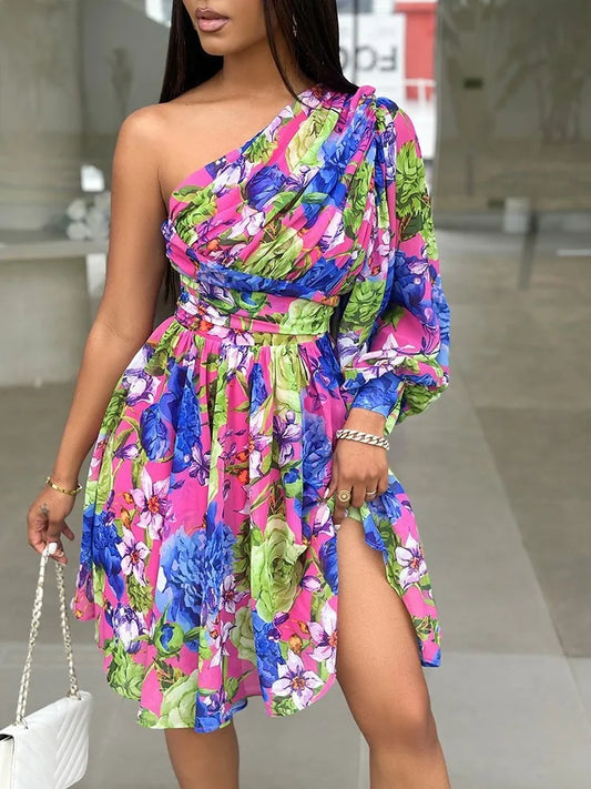 Woman wearing elegant blue pink and green floral boho off-shoulder dress for office and party occasions