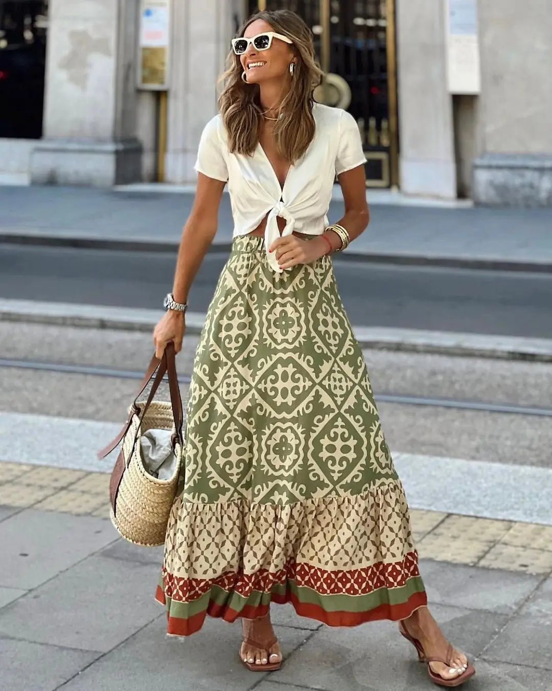 Green and beige tile print boho maxi skirt with rust red border trim styled with white crop top