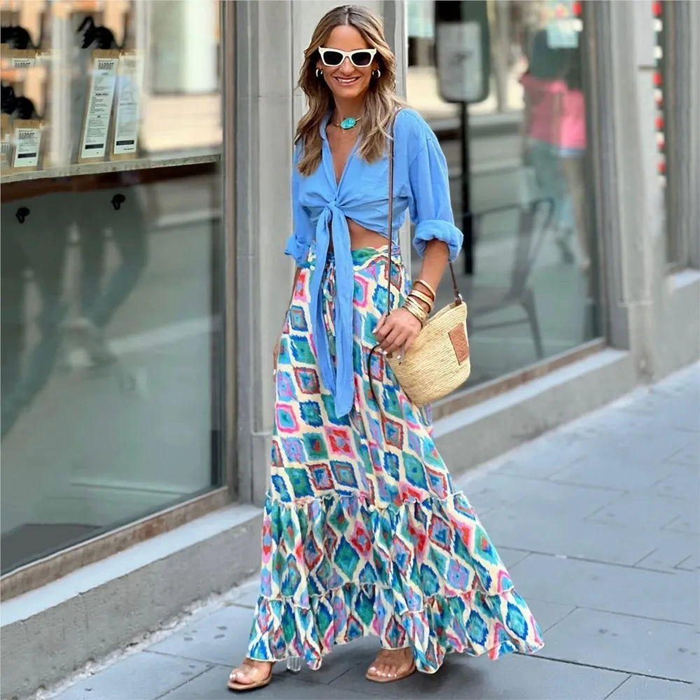 Multicolor geometric print boho maxi skirt with tiered ruffles styled with blue crop top - street style