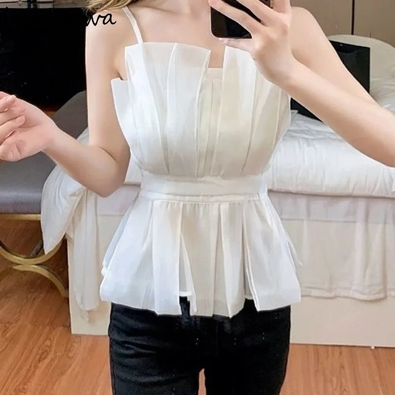 White pleated peplum top with straps and slim waist design